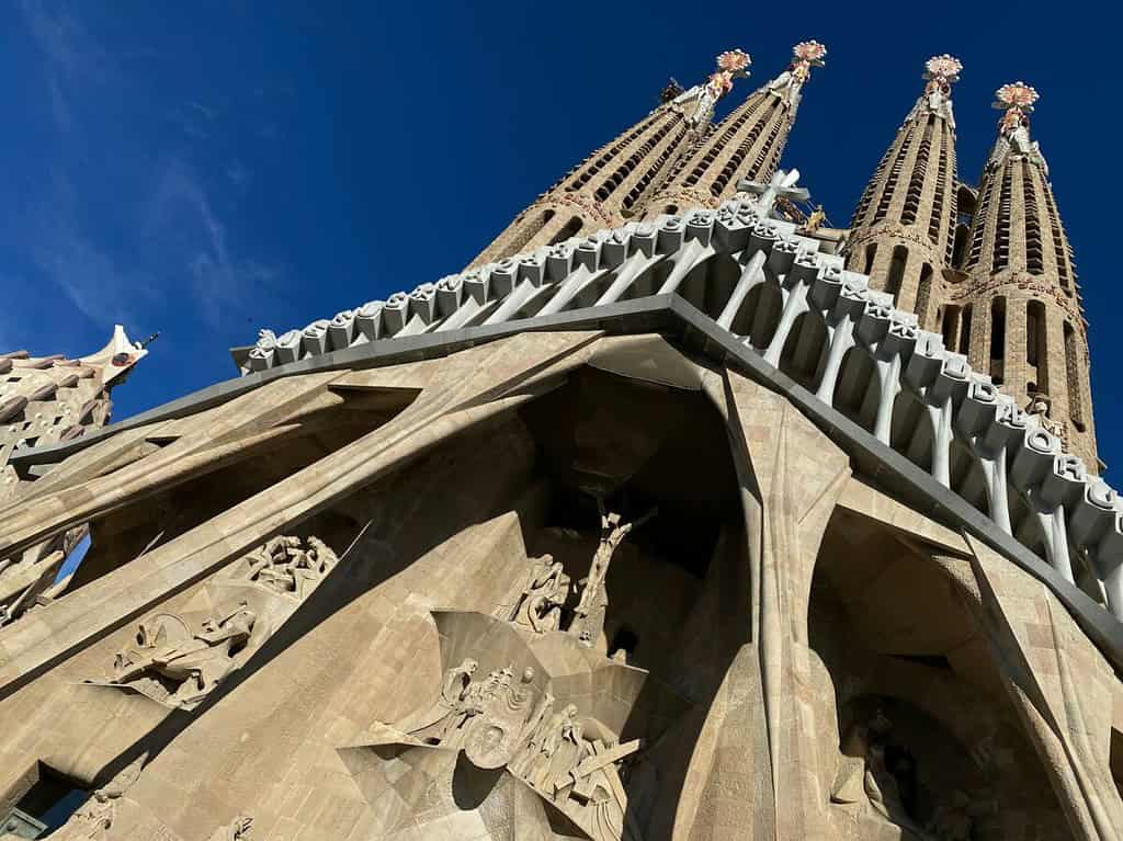 Ornate, towering cathedral of Sagrada Familia with elaborate spires and sculptures